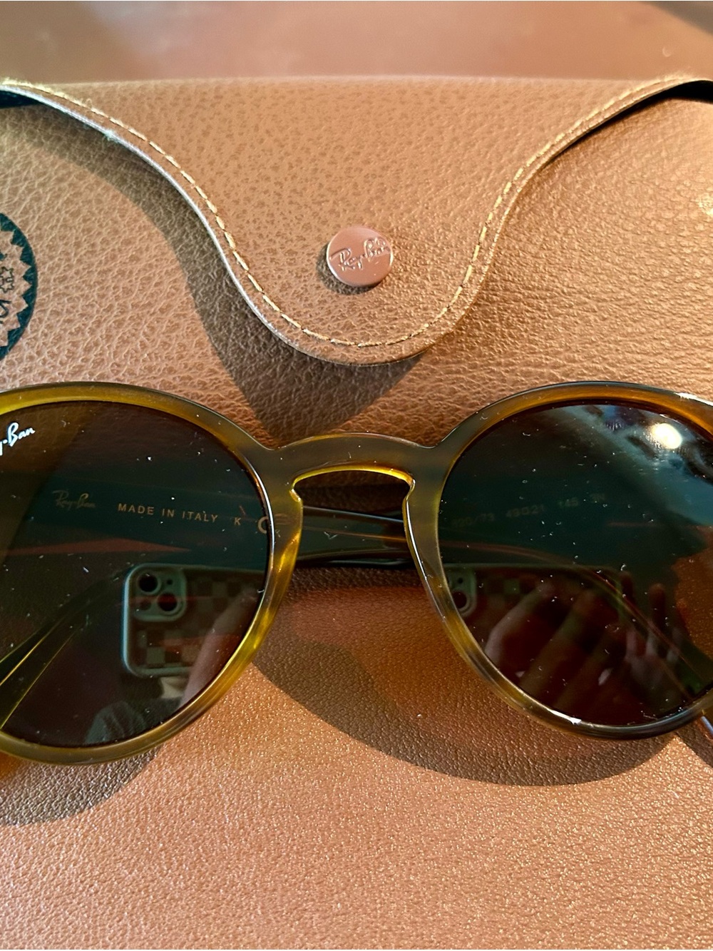 Ray-Ban Round Tortoiseshell Sunglasses with Dark Lenses